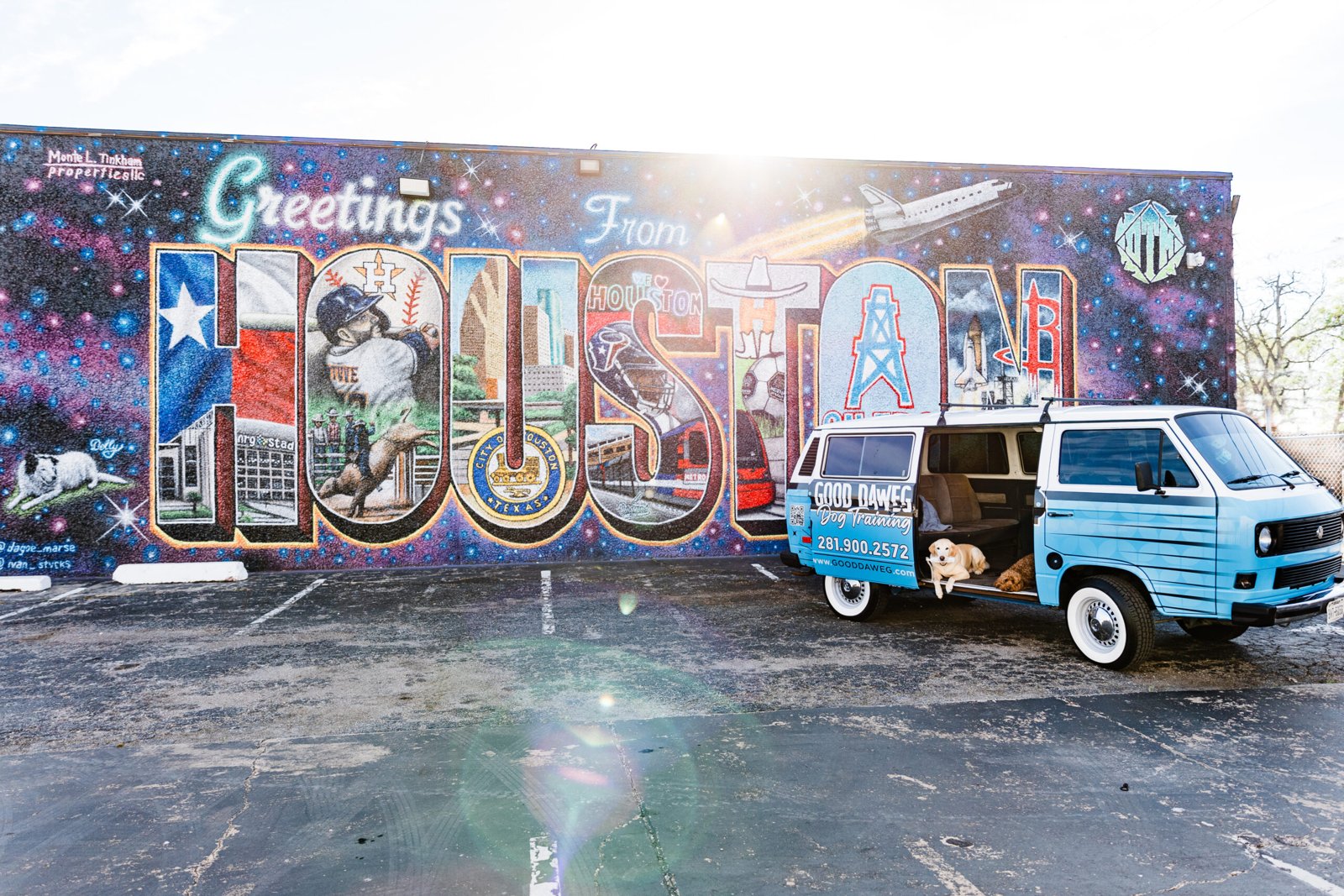 Good Daweg van beside a Houston mural Good Daweg van beside a Houston mural